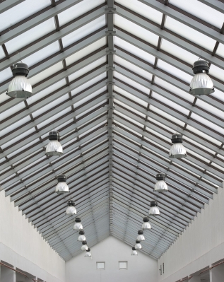 Roof of industry factory, and lamps. Interior design.